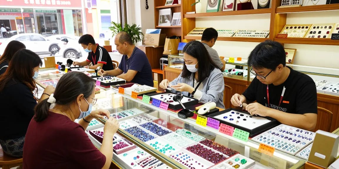 Engaging shopping scene at https://www.mygemspot.com featuring diverse gemstones, knowledgeable merchants, and vibrant displays.