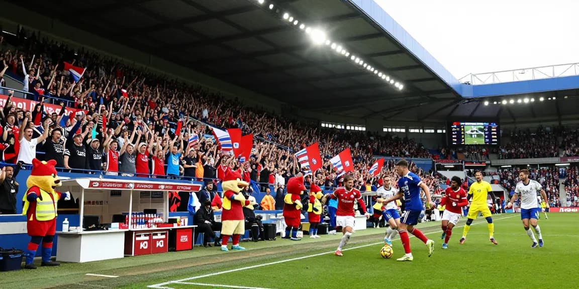 Exciting scene of bk8 Premier League match with passionate fans cheering and players competing.