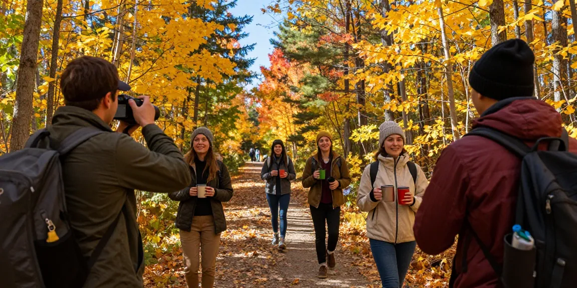 Serge Robichaud exploring New Brunswick's vibrant fall trails with friends, highlighting outdoor adventure and community.